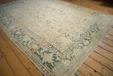 Evenly worn corner of a vintage Heriz rug, highlighting the dusty blue Turtle Samovar border.