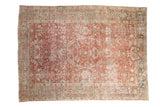 Distressed vintage Heriz carpet with an allover serrated leaf design in dusty red and muted slate blue.