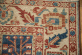 Close-up of a vintage Baktiari corner showing a cypress tree panel and a wide floral border.