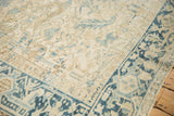 Low-pile texture and Turtle Samovar border motif on a vintage distressed Heriz carpet.