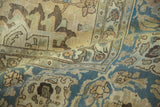Distressed vintage Tabriz carpet pile, Safavid palmettes in dusty sapphire blue and ivory tones.