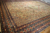 Traditional Joshegan carpet's navy and cherry red borders featuring a reciprocating pawn motif.