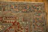 Distressed vintage Mehrivan carpet corner, showing Turtle Samovar border, copper, and slate blue patterns.