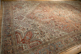 Distressed Mehrivan border with Turtle Samovar, Herati motifs, copper, terracotta, and slate blue.