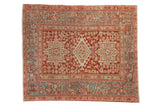 Vintage Karaja square rug with a distressed geometric medallion in cherry red, slate blue, and sand.