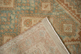 Afshar rug showing hand knotted foundation, secure side, and distressed geometric patterns.