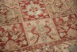 Worn knot heads across the floral top-view motifs of a Persian Baktiari garden panel rug.