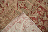Hand-knotted foundation and secure side cord of a vintage Baktiari rug seen from a folded corner.
