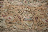 Close-up of a Safavid-style lantern samovar motif with worn pile and dusty blue accents.