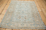 Distressed texture of vintage Malayer rug border with blue turtle samovar motifs.