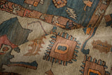 A folded antique Serapi carpet showing its textured low pile, visible knot heads, and primitive motifs.