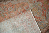 Hand-knotted foundation of an antique Malayer rug, revealing its distressed terracotta pile.
