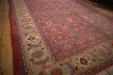 Wide sand-colored border with Herati and palmette designs on a vintage Persian Mahal rug.