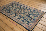 Vintage Lilihan rug's vine and floral main border, detailed Herati motif, and intact side selvage.