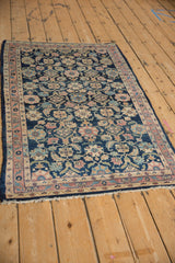 Persian Lilihan rug detail: Herati pattern in navy blue, ivory, and dusty blush.