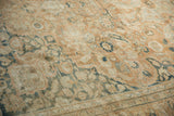 Distressed vintage Khorassan rug pile with faded copper and dusty teal blossoms.