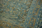 Intricate blue and terracotta vines, minor blossoms, with abrash on distressed vintage pile.