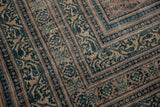 Distressed antique Serbend carpet with worn pile, allover boteh motif in navy and blush.
