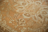 Fine weave and distressed pile of a vintage Heriz carpet in soothing neutral shades.