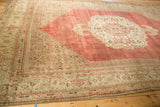 Antique Distressed Bijar carpet with faded Herati spandrel and turtle samovar border in blush and ivory.