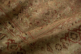 Worn pile texture of an antique Bijar carpet, showing faded Herati motifs and blush tones.