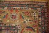Antique Mahal carpet corner with Herati border, brick red, sapphire blue florals, and fringe.