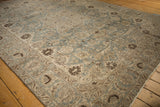 Distressed Tabriz carpet section with slate blue, antique ivory lotus flowers, and even wear.