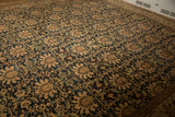 Antique Malayer carpet detail: allover palmette pattern in navy, antique ivory, and jade with mostly even wear.