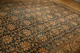 Antique Malayer carpet showcasing allover navy blue and sand palmette motif with jade accents.