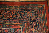 Corner detail of the Samovar Turtle border motif on an antique Persian Bijar carpet.