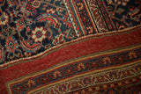 Close view of the restored side cord selvage and Samovar Turtle border on an antique Persian Bijar carpet.