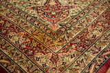 Germinating lotus flower design motif in the intricate border of a fine Kerman carpet.