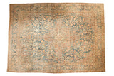Vintage distressed Kerman carpet, medallion with allover floral design, dusty blue and faded ivory tones.