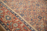 Detailed view of the red Turtle Samovar border against the camel-colored Herati field of the rug.