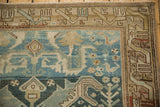 The Caucasian-inspired main border with serpent-like relief and even wear on a vintage Mehreban rug.
