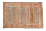 Vintage Kurdish Hamadan rug with a distressed allover plant motif in powder blue and faded raspberry red.