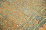 Close-up on the Turtle Samovar border and floral patterns in weathered copper and dusty blue tones.