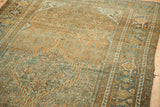 Worn hand-knotted pile showing the Turtle Samovar border in dusty blue and copper.
