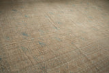 Distressed Ersari carpet, showing geometric guls, dusty teal, cream tones, and mostly even wear.