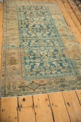 Vintage distressed Kurdish Hamadan rug with camel Samovar border and dusty blue Herati field.