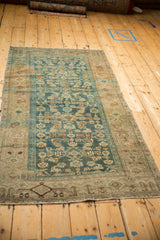Distressed sapphire blue Herati field and camel Samovar border of a vintage Kurdish Hamadan rug.