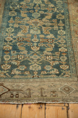 Distressed Kurdish Hamadan main border with meandering vine and Samovar design.