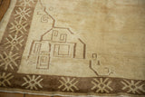 Corner spandrel detail with geometric scrolled tendrils and a snowflake design border.