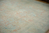 Heavily abrashed vintage Mahal pile, showing faded blue and ruby grapefruit palmettes.