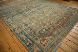 Vintage Distressed Bijar carpet corner, red border elements, dusty teal, and abrashed field.