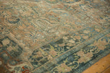 Distressed texture with abrash, featuring scrolled vinery and a checkered lily border design.
