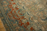 Distressed texture, secured selvage, and checkered lily border of a vintage Bijar carpet.