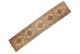 Vintage tea washed Kerman runner with diamond medallions and intricate scrolling details on a pale ochre gold field.