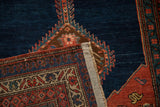 The hand-knotted reverse and restored side cord of an antique Persian Bijar runner.