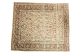 Distressed Lilihan carpet with allover floral design, muted earth tones, 9'1